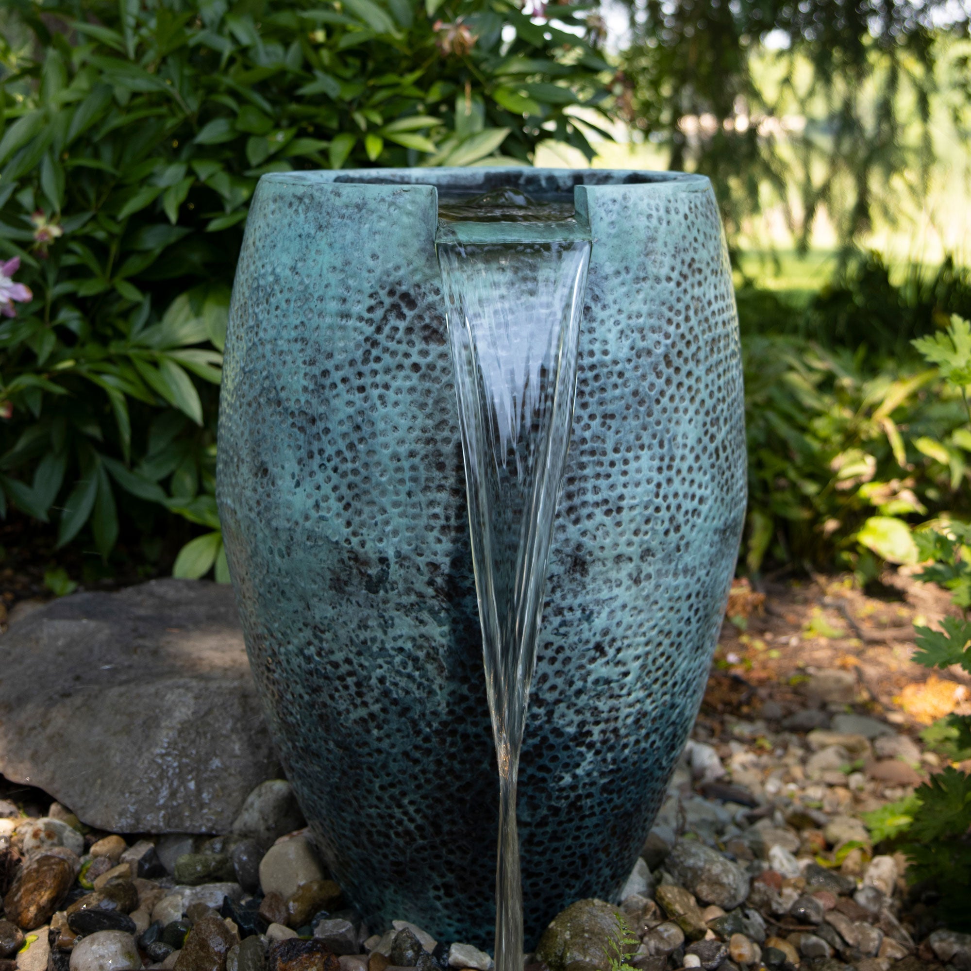 Aura Vase with spillway — flowing water detail