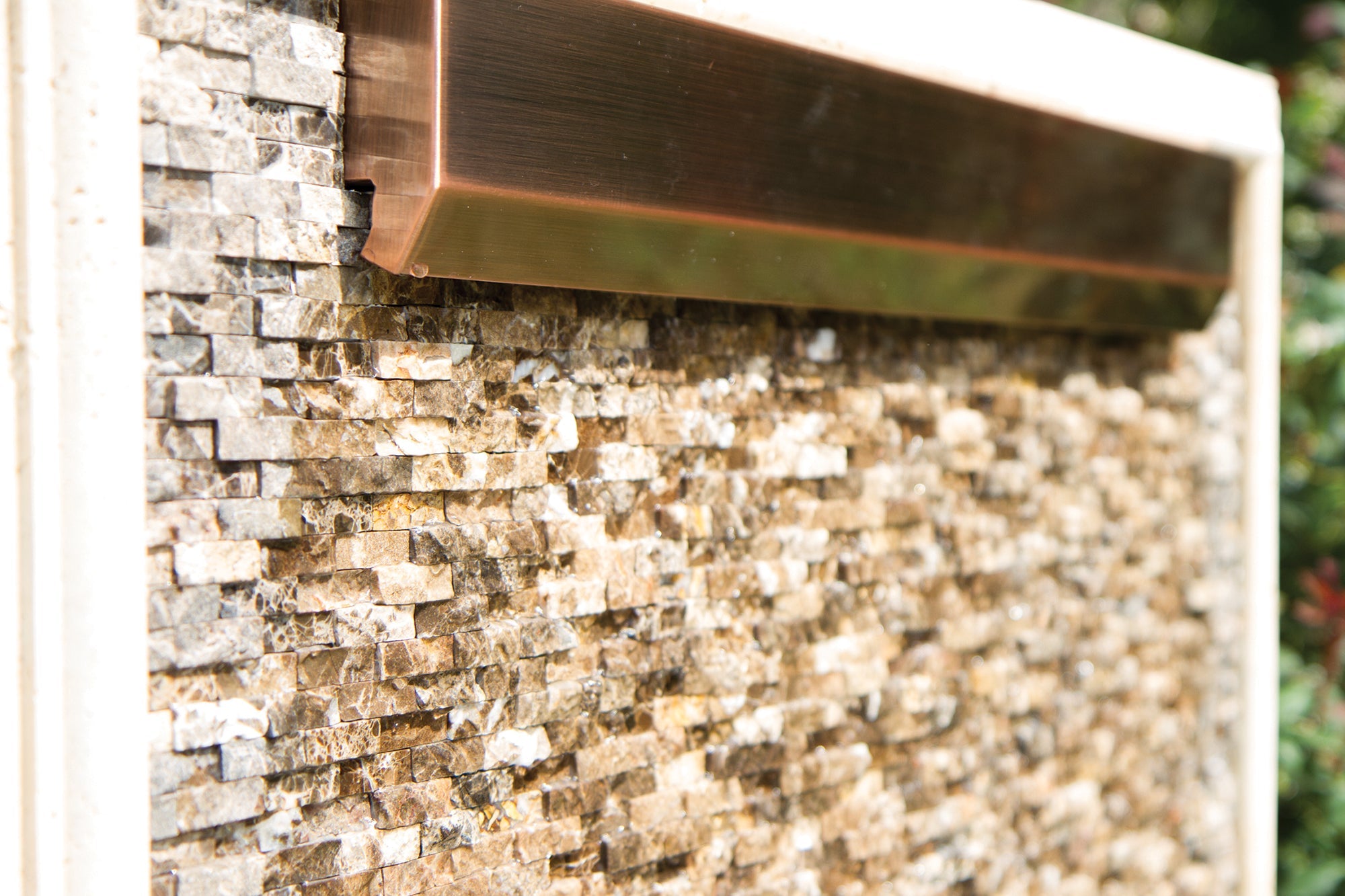 24" Copper Finish WaterWall Spillway — installed view