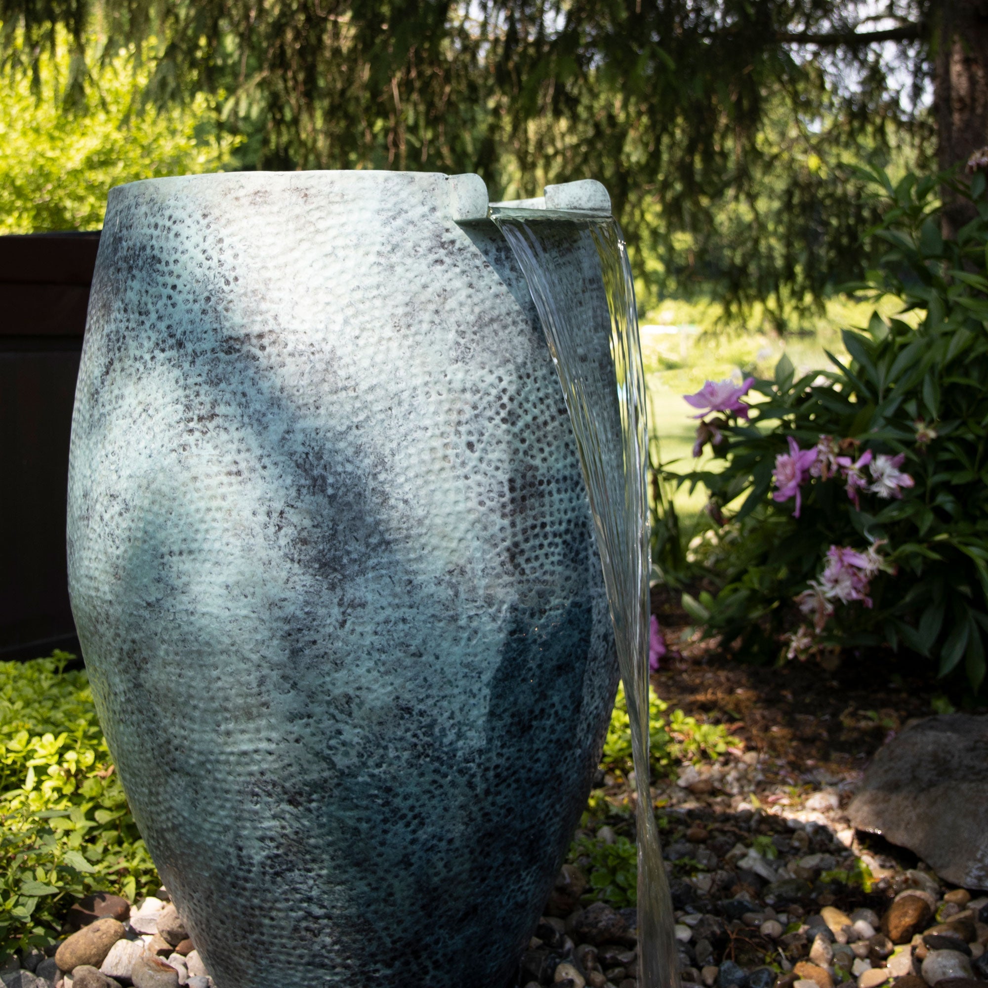 Atlantic Aura Vase Kit installed — garden water feature